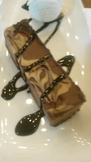 Chocolate salted caramel tart with vegan ice cream and chocolate sauce at Grey Horse Inn in East Boldon