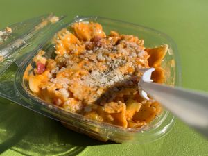 Buffalo Chik'n Pasta Salad from "Cheeze & Thank You" at the People's Plant-Based Party at Kalamazoo Farmers Market on 10/6/24, sponsored by PFC & Vegan Kalamazoo at Vegan Kalamazoo in Kalamazoo