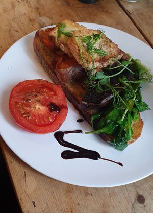 Rustic Vegan 🌱 Mhmmm 💕 - toasted bread with mushrooms, sweet potatoes, fried tofu, spinach, avocado and tomato😄! at Cafe Rust in Brighton