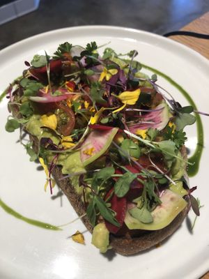 beautiful avocado toast! just order it vegan with no cheese to get it this way :) at Coffee Parlor in Long Beach