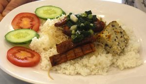 'Mock' pork with rice and savoury cake. at Thien Duyen Ben Thanh in Ho Chi Minh City