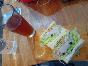 Taro sandwich a an ice tea which was only 15TWD and very large! at Vegan Daily 半半食室 - BànBan Shí Shì in Taichung