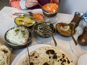 Malai kofta, saag with tofu and tikka masala with tofu, two different kind of rice and garlic naan.  at Indian Box in Santiago