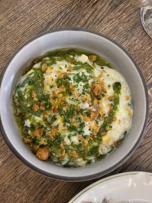 Risotto-style spinach and corn in coconut cream, puffed corn and pumpkin seed crisp  at Paisano in Helsinki