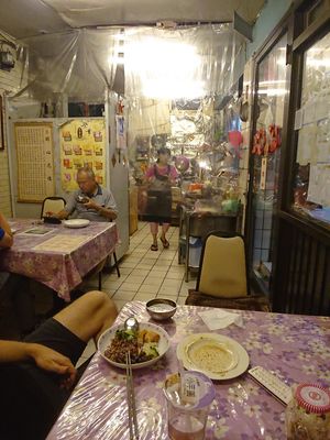 Interior, it's basically only three tables and you can the owner standing in the kitchen at Zhāng TàiTài 張太太緣素食 in Taipei