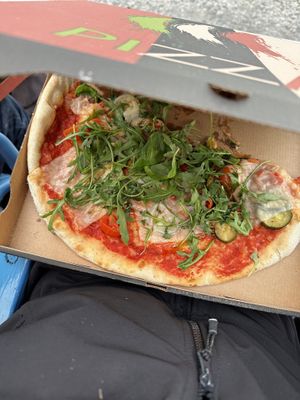 Half eaten pizza, because we were hungry  at Da Francesco in Nice