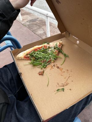 Half eaten pizza, because we were hungry  at Da Francesco in Nice