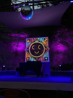 Outside stage at night - DJ setup at Cheer up Charlie's in Austin