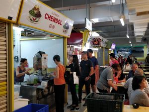Queue in front of stall which is located in the yellow section of the food centre at Old Amoy Chendol - Chinatown in Central Singapore