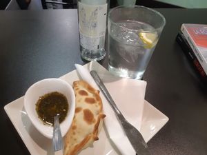 Spicy soya empanada with chimichurri sauce at Alma Criolla in Zaragoza