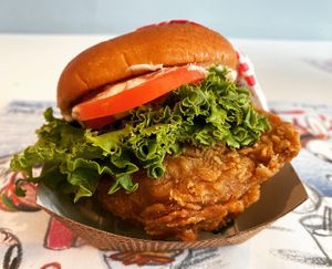 Charlie’s Chicken Sandwich with lettuce and tomato   at Monty's Good Burger - Echo Park in Los Angeles