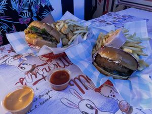 Double burger with 50/50 tots and fries (left) chicken sandwich with fries   at Monty's Good Burger - Echo Park in Los Angeles