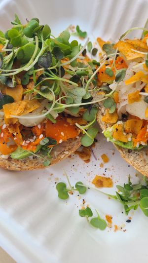 Bagel with coconut bacon, carrot lox and cashew cream cheese  at The Sprout Kitchen in St Augustine