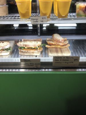 Toasties in the case (chick’n, feta, Gouda rocket and Vegemite/ham/tomato and cheese)   at Super Raw in Preston