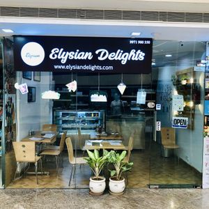 Exterior of cafe, inside JMD Galleria. at Elysian Delights - Ethigreenz in Gurugram