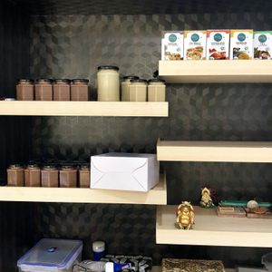 Jars of in-house vegan “Nutella” and peanut butter. at Elysian Delights - Ethigreenz in Gurugram