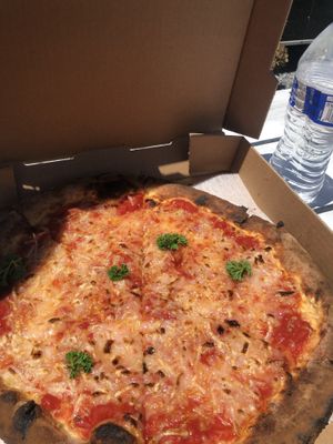Daiya cheese pizza at Cosa Pizza - Food Truck in Chincoteague