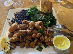 Southern Fried Plate with fried tofu and lemon aioli, black beans and garlicky kale  at ION - It's Only Natural Restaurant in Middletown