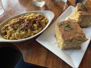 Mac and cheese with bacon + cornbread 😋  at ION - It's Only Natural Restaurant in Middletown