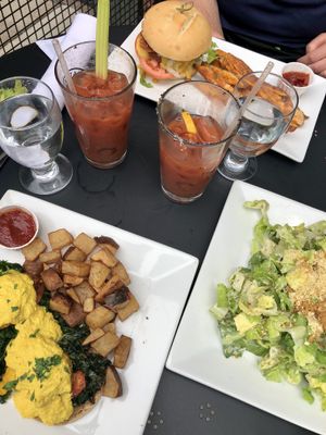 Vegetable eggs Benedict, Ceaser salad, bacon cheeseburger, Bloody Mary’s  at ION - It's Only Natural Restaurant in Middletown
