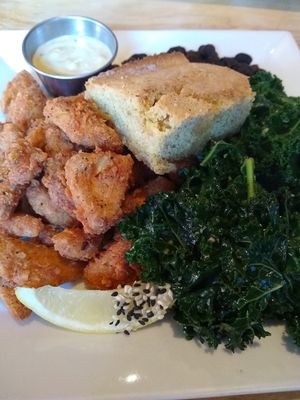 Southern plate with kale, crispy fried tofu, corn bread and black beans at ION - It's Only Natural Restaurant in Middletown