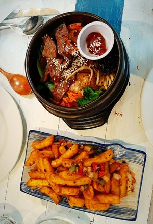 Bibimbap and salt and chilli chips at Puti Vegan Cafe in Glasgow