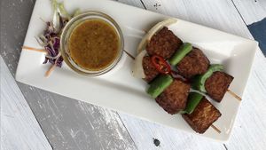 Satay sauce and tempeh skewers  at Puti Vegan Cafe in Glasgow