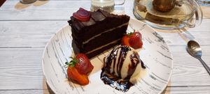 Chocolate cake and ice cream at Puti Vegan Cafe in Glasgow