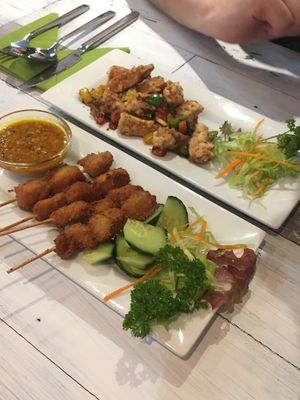 Salt & Pepper tempheh (amazing!)
and 
Chicken satay skewers at Puti Vegan Cafe in Glasgow