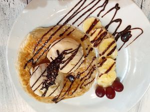 Roti canai with banana and ice cream at Puti Vegan Cafe in Glasgow