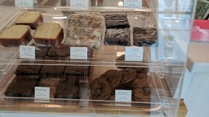 Baked goods case, including vegan brownies. at Off Track in Charleston