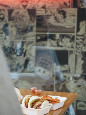 The Menu with 2 Bao Burgers and Sweet Potato Fries at BAO BAR 1070 in Vienna