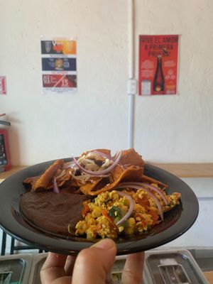 Chilaquiles, scrambled tofu and beans. at VegCo Restaurante Vegano in Queretaro
