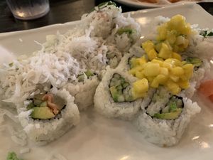 Here are the two vegan sushi rolls I ordered. I got the college avenue roll (left) and the vegetarian ceviche roll (right). Just got no sauce on either because the sauce has dairy. at Green's in Blacksburg