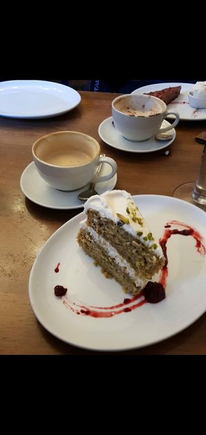 Vegan pistachio cake & coffee at Goji Vegetarian Cafe and Deli in York