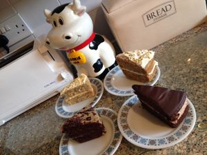 a selection of vegan cakes to take away - hello Happy Cow at Goji Vegetarian Cafe and Deli in York