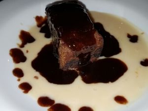 Sticky toffee pudding with vegan custard at Goji Vegetarian Cafe and Deli in York