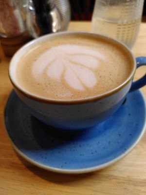 Decaf oat milk latte (August 2022) at Goji Vegetarian Cafe and Deli in York