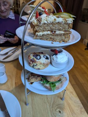 vegan afternoon tea- homemade sandwiches, vegan quiche, scone and cakes at Goji Vegetarian Cafe and Deli in York