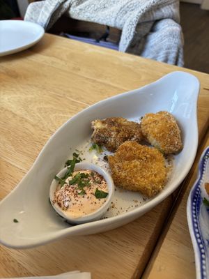 Crispy buffalo cauliflower bites harissa mayo  at Goji Vegetarian Cafe and Deli in York