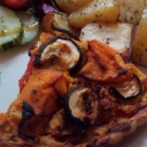 Sweet potato main with roast potatoes and salad  at Goji Vegetarian Cafe and Deli in York
