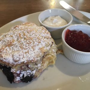 Fruit scone with coconut cream and jam at Goji Vegetarian Cafe and Deli in York