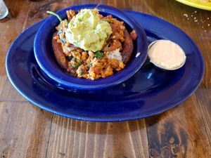 Tropical guac bowl special with blackened tempeh and vegan red aioli at Coyote Kitchen in Boone