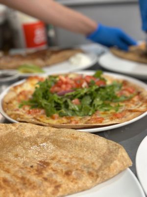 Tortilla Pizza Rústica and organic spinach and tomato Quesadilla at Claire's Corner Copia in New Haven