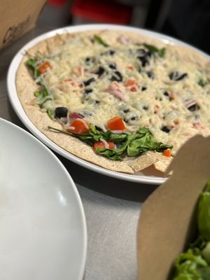 Mediterranean Flat Bread Tortilla Pizza at Claire's Corner Copia in New Haven