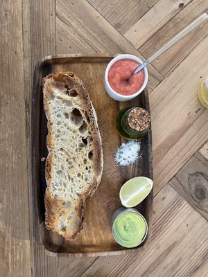 Avocado toast with tomato pure, lime, extra virgin olive oil and salt with chives.  at Pacífico in Ourense