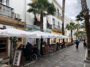 Street view of outdoor dining area at Vintage El Palmito in Cadiz
