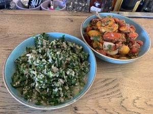 Tabouleh salad; tomato and chilli salad at Khudari in Tel Aviv