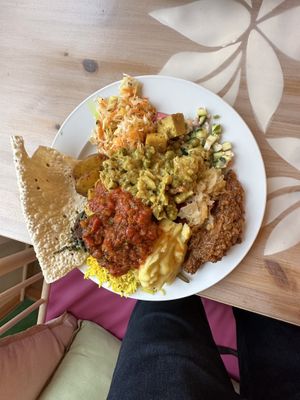 Huge plate of food cooked by devotees   at Kasvisravintola Brindavan & Bhajan Cafe in Helsinki
