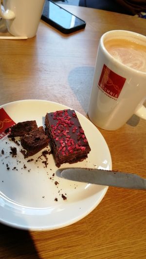 Oat Latte with a vegan raspberry brownie at Insomnia Coffee Company in Ennis